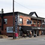 Bridgeland Market brick storefront on a Bridgeland street corner, Calgary