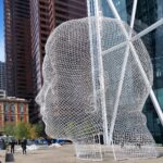 Jaume Plensa's Wonderland wire-mesh head sculpture outside The Bow, downtown Calgary