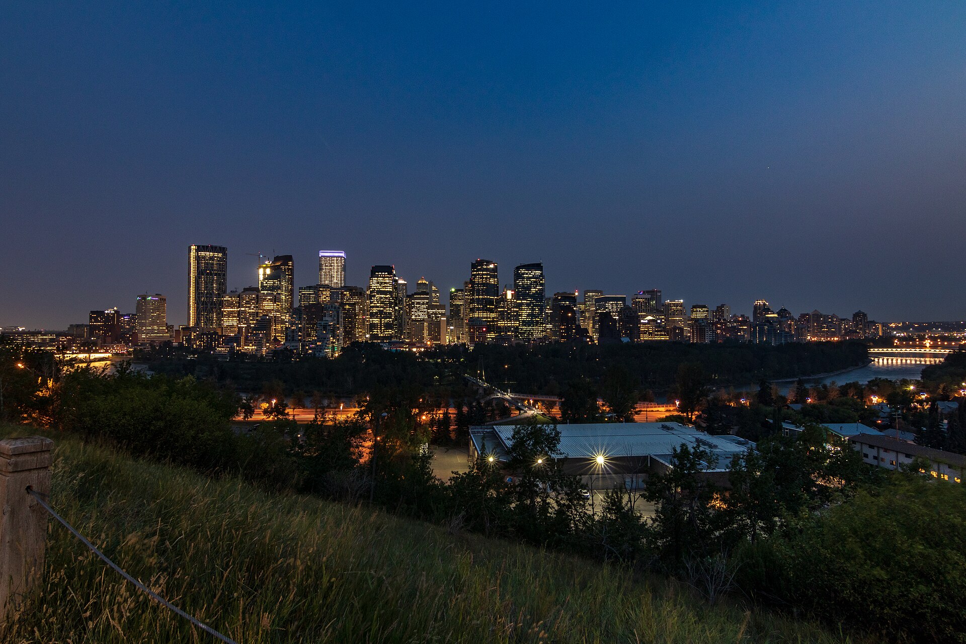 Calgary skyline at night over the Bow River